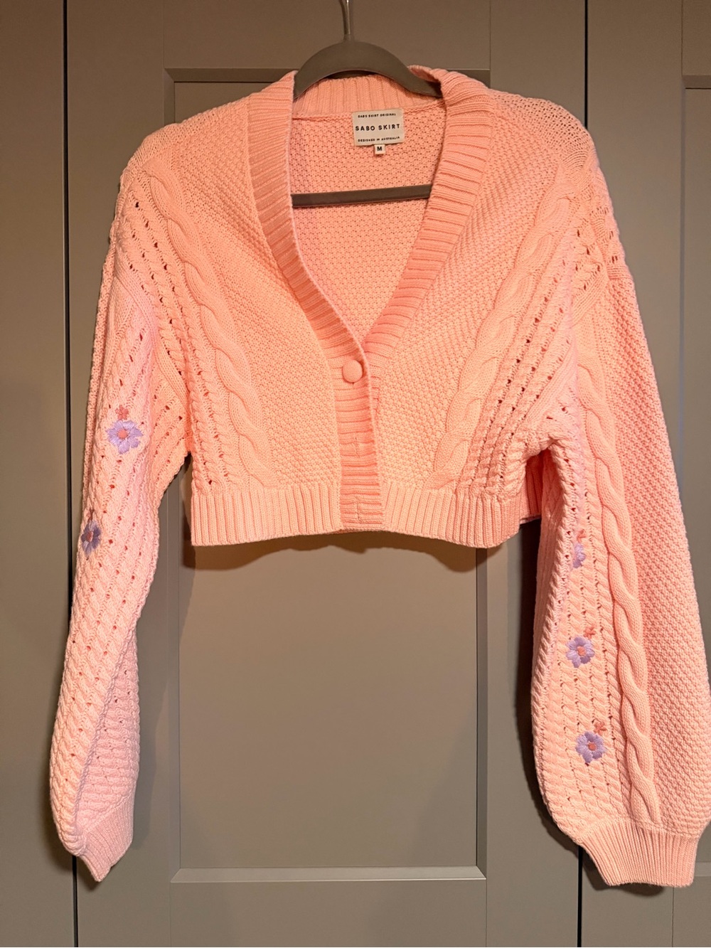 Sabo Skirt Peach-Pink Cropped Cable Knit Cardigan with Floral Sleeves